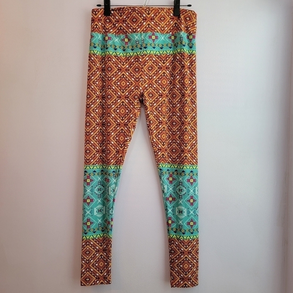 LuLaRoe Pants - Luluroe Orange Printed Pattern Leggings Size Tall and Curvy